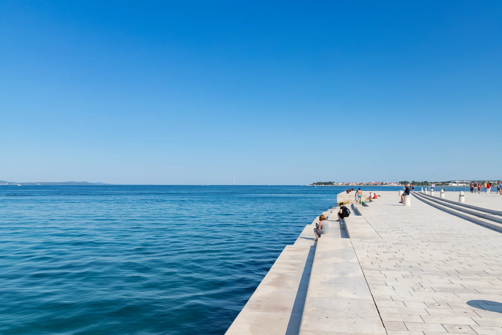 White stone steps meeting the sea at Morske orgulje